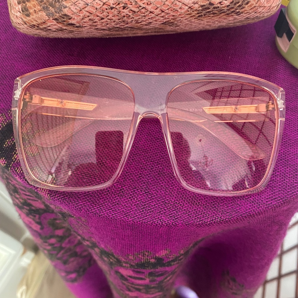 Oversized Pink sunglasses and pink snakeskin hard case